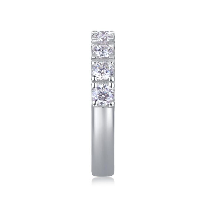 WhatsApp Image 2025-11-25 at 1.28.24 PM A refined seven-stone band set with shimmering 0.1-carat moissanites, each held in a sculpted claw setting that catches the light with every move. Sleek, polished, and effortlessly elegant — a modern classic crafted for everyday luxury