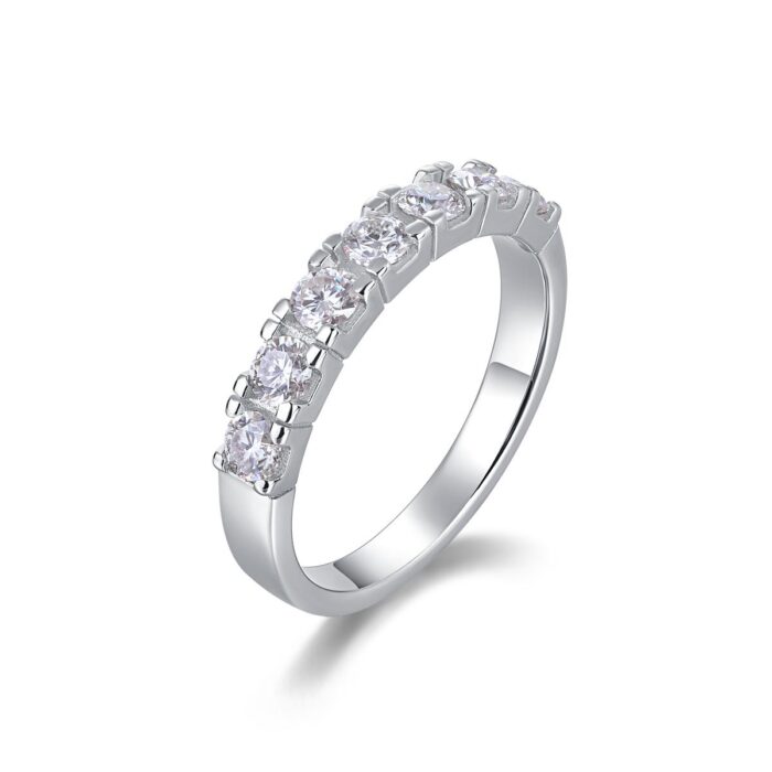 A refined seven-stone band set with shimmering 0.1-carat moissanites, each held in a sculpted claw setting that catches the light with every move. Sleek, polished, and effortlessly elegant — a modern classic crafted for everyday luxury A refined seven-stone band set with shimmering 0.1-carat moissanites, each held in a sculpted claw setting that catches the light with every move. Sleek, polished, and effortlessly elegant — a modern classic crafted for everyday luxury