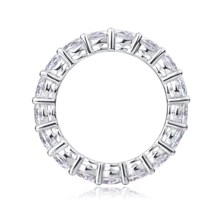 A continuous circle of 0.3-carat moissanites, each meticulously set to create an unbroken ribbon of brilliance. Sculpted with elevated prongs for maximum light play, this eternity band delivers a statement of refined sparkle and timeless elegance A continuous circle of 0.3-carat moissanites, each meticulously set to create an unbroken ribbon of brilliance. Sculpted with elevated prongs for maximum light play, this eternity band delivers a statement of refined sparkle and timeless elegance