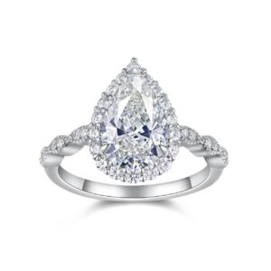 A 3-carat pear-cut moissanite that glows like liquid fire, wrapped in a halo of icy brilliance and a seductive pavé band